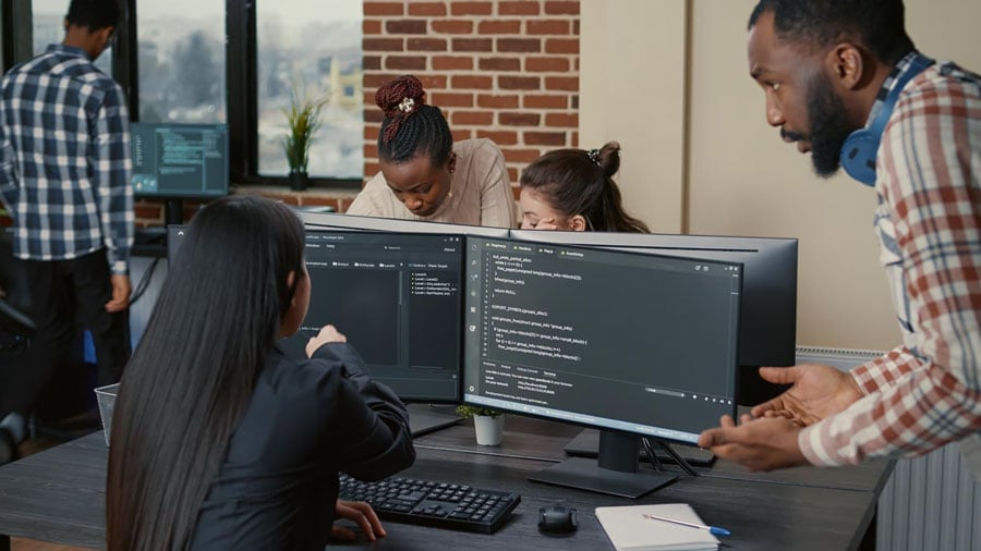 A team of people working on a software project